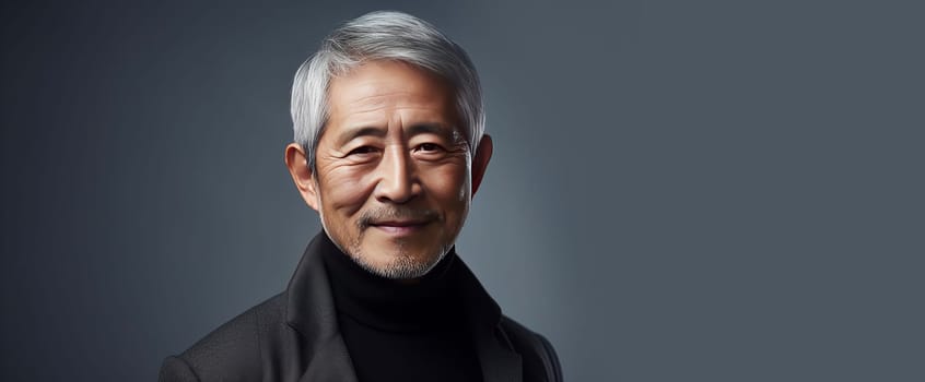 Elegant smiling elderly Asian man with gray hair, on a silver background, banner, copy space, portrait. Advertising of cosmetic products, spa treatments, shampoos and hair care products, dentistry and medicine, perfumes and cosmetology for men