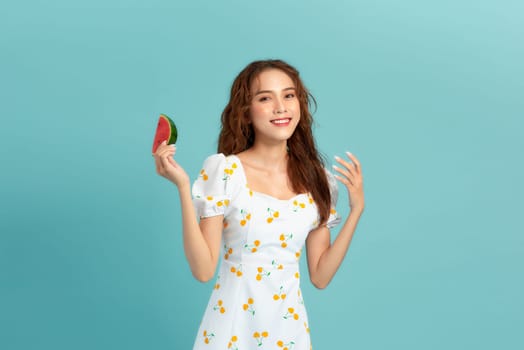 Beautiful young woman with watermelon on blue background. panorama