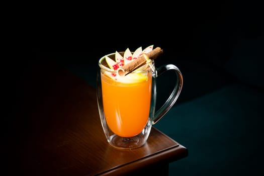 tropical orange cocktail with cinnamon