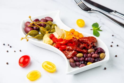 assorted nuts and dried vegetables on a light background