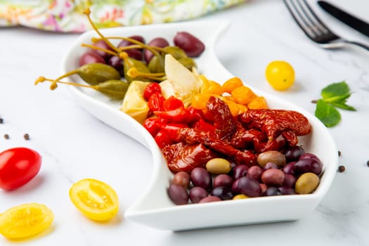 assorted nuts and dried vegetables on a light background