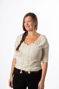 Portrait of a forty something woman, isolated against a white background