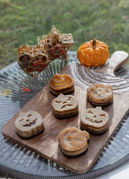 Delicious pumpkin ghost made with Agar powder and Halloween pumpkin. Tasty jelly in the shaped of cute ghost pumpkin. Celebrate with Halloween holiday, Pumpkin demon, Space for text, Selective focus.