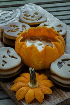 Delicious pumpkin ghost made with Agar powder and Halloween pumpkin. Tasty jelly in the shaped of cute ghost pumpkin. Celebrate with Halloween holiday, Pumpkin demon, Space for text, Selective focus.