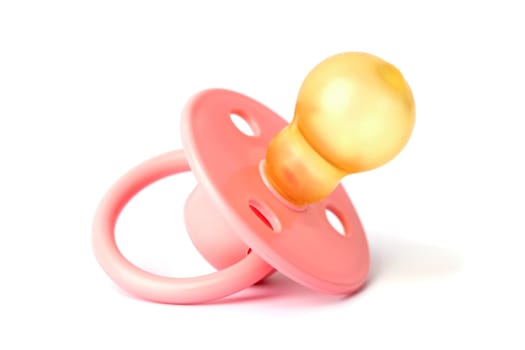 Orthodontic pacifier isolated on white. Pink baby pacifier isolated on white background.