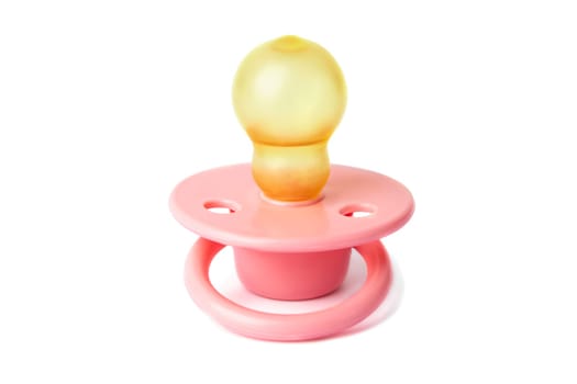 Orthodontic pacifier isolated on white. Pink baby pacifier isolated on white background.