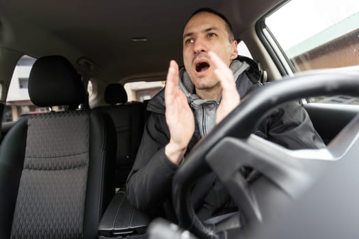Worried man travelling by car. High quality photo
