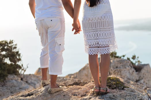 Honeymoon couple romantic in love at beach sunset.