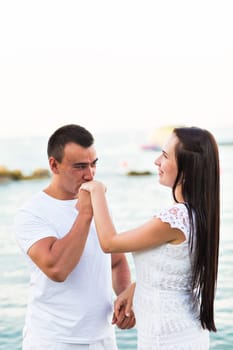 Boyfriend kiss the girl hand in nature