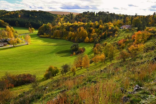 Beautiful colourful autumn landscape in the Czech Republic. Colorful trees in nature in autumn season. Seasonal concept for outdoor activities. 