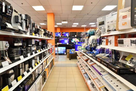 Moscow, Russia - Oct 19. 2023. TVs and coffee makers in the DNS network store selling household appliances in Zelenograd