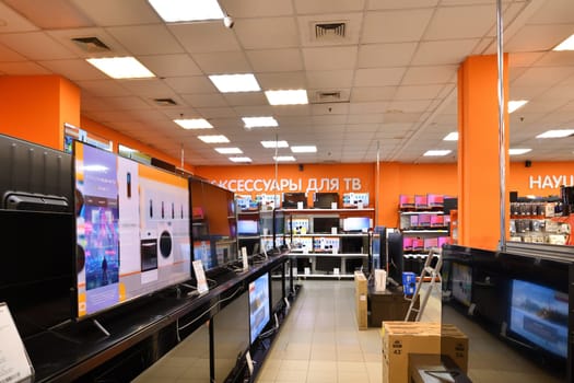 Moscow, Russia - Oct 19. 2023. TVs and and others in the DNS network store selling household appliances in Zelenograd