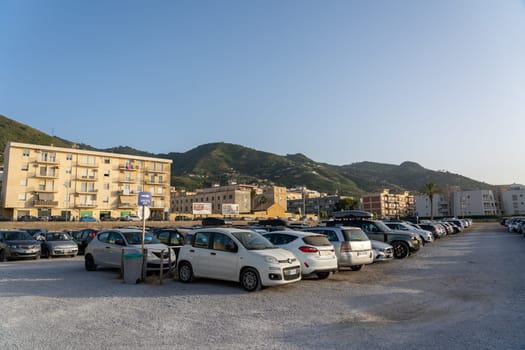 Cefalu, Sicily, Italy - July 21, 2023: Cars parked on the parking lot at the local beach