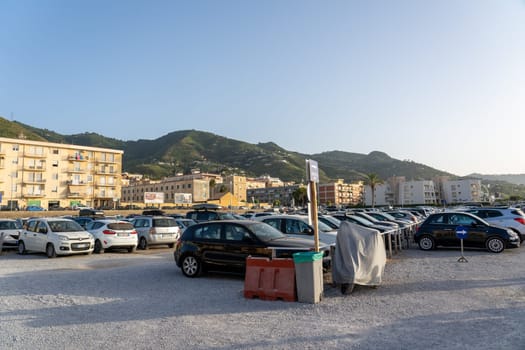 Cefalu, Sicily, Italy - July 21, 2023: Cars parked on the parking lot at the local beach