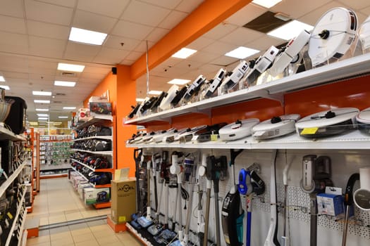 Moscow, Russia - Oct 19. 2023. Robot vacuums and and others in the DNS network store selling household appliances in Zelenograd