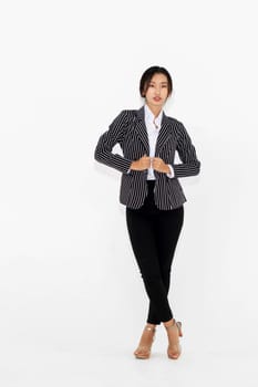 Asian woman full body portrait on white background wearing formal business suit . Jivy