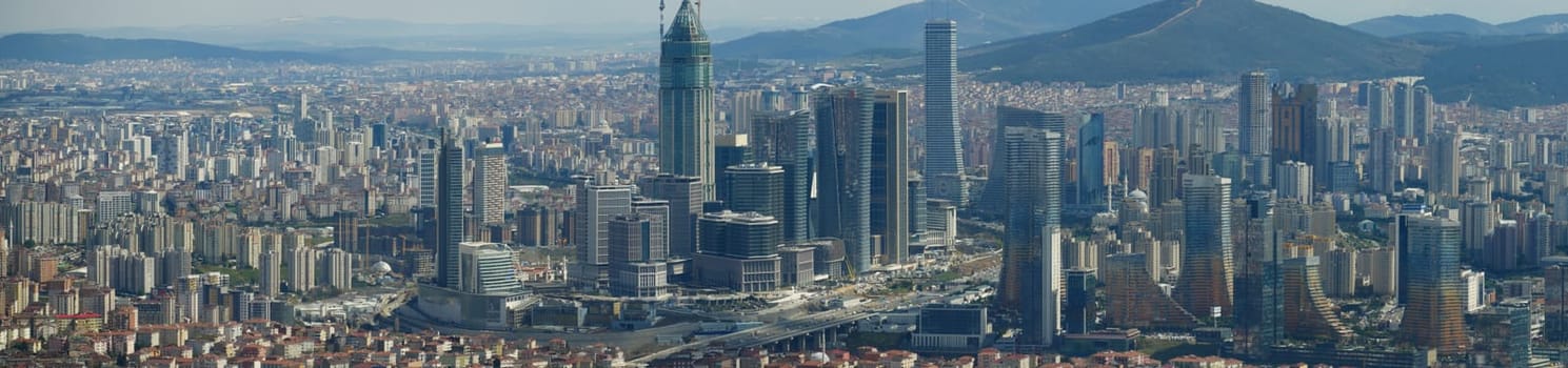 arialview of istanbul financial and residential buildings at morning .