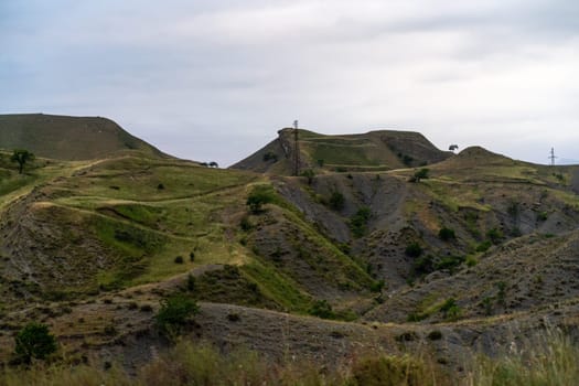 Caucasian mountain. Dagestan. Trees, rocks, mountains, view of the green mountains. Beautiful summer landscape