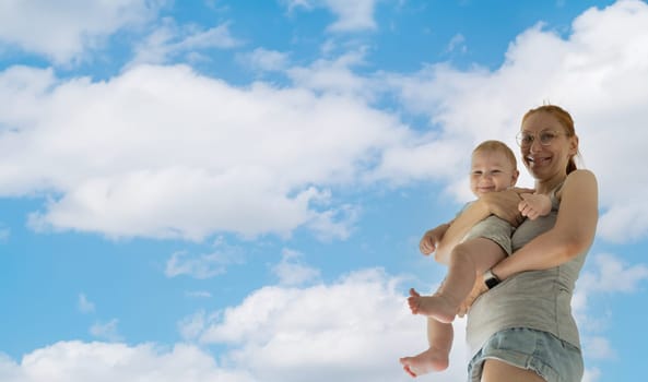 A woman holding a baby in her arms