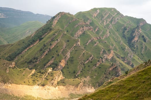 Caucasian mountain. Dagestan. Trees, rocks, mountains, view of the green mountains. Beautiful summer landscape