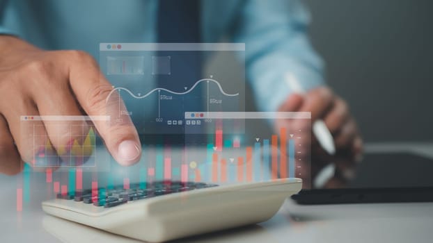 Business people are analyzing business and managing corporate data with charts, indicators, and KPIs to improve organizational performance as well as marketing strategies and financial strategies.