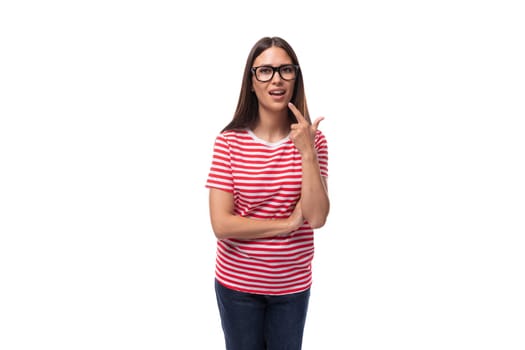 pretty 35 year old european lady in a red striped t-shirt wears glasses for vision correction on a white background with copy space.