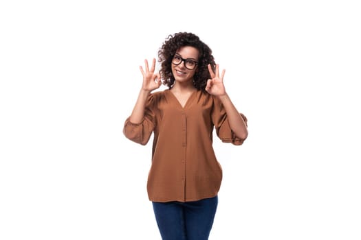 young confident successful curly leader woman wearing brown blouse.