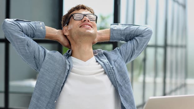 man resting in office relaxing, businessman meditating in lotus position