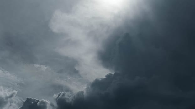 Black and white tones of the sky on a rainy day. Aerial view of the sky and black clouds. Dark grey storm clouds. Dramatic sky before the storm.