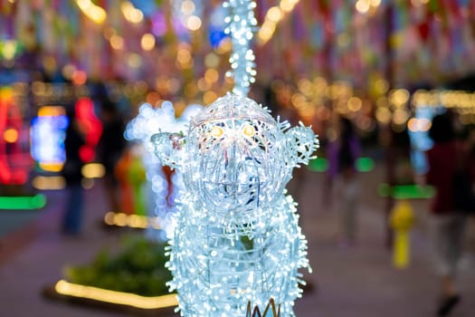 Colorful Lanna paper lanterns hang in Lamphun temples. Popular lantern festival during Loy Krathong in northern Thailand. Traditional Yi Peng paper lantern.