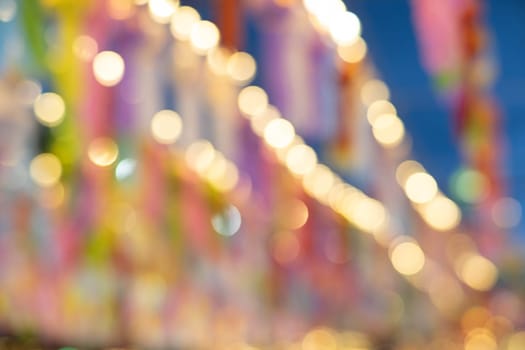 Abstract background with bokeh of lantern lights at night. Popular lantern festival during Loy Krathong in northern Thailand.