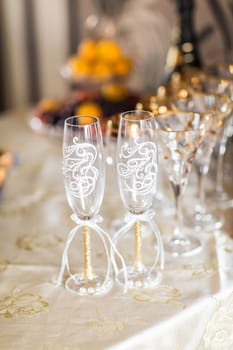 decorated glass of champagne. Two wedding glasses