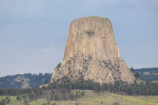 Cloudy days seeing Devils Tower in the summer . High quality photo