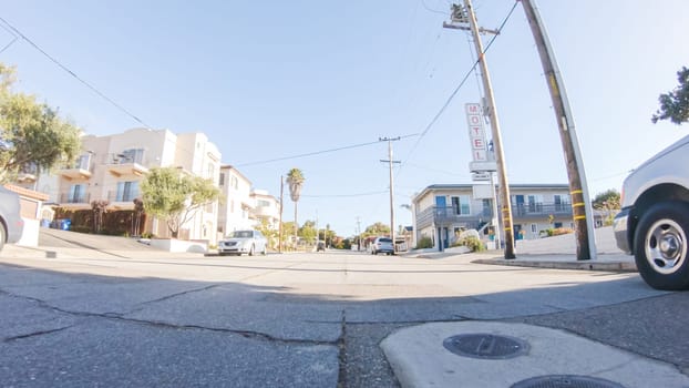 Santa Maria, California, USA-December 6, 2022-Car driving through the streets of Pismo Beach town, California during winter.