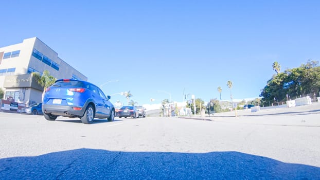 Santa Maria, California, USA-December 6, 2022-Car driving through the streets of Pismo Beach town, California during winter.