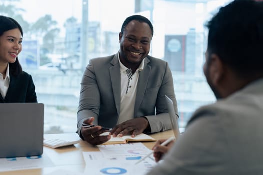 Diverse business people meeting and strategy in planning, team discussion or sharing idea at office.