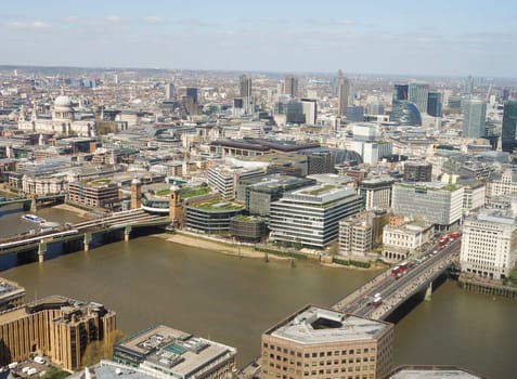 Looking down at the city of London with many iconic buildings