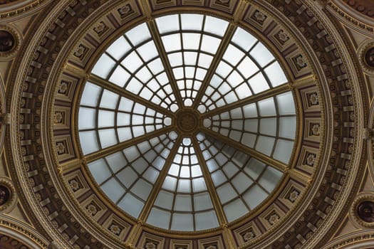 London, UK - Oct 31, 2023 - Light passes through The high ceiling glass dome inside main hall of The National Gallery. Ceiling dome architecture design of the skylight at The National Gallery is an Art Museum in Trafalgar Square, Look up, Space for text, Selective focus.