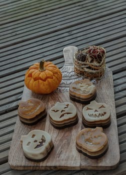 Delicious pumpkin ghost made with Agar powder and Halloween pumpkin. Tasty jelly in the shaped of cute ghost pumpkin. Celebrate with Halloween holiday, Pumpkin demon, Space for text, Selective focus.