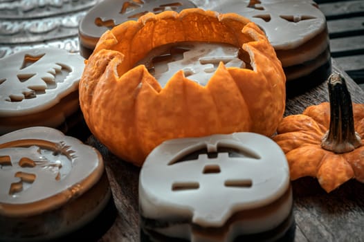 Delicious pumpkin ghost made with Agar powder in Halloween pumpkin. Tasty jelly in the shaped of cute ghost pumpkin. Celebrate with Halloween holiday, Pumpkin demon, Space for text, Selective focus.