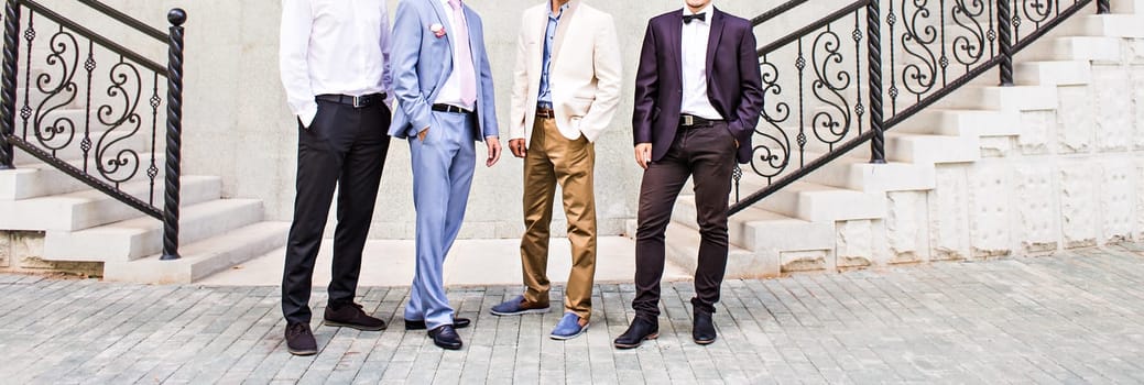 Groom With Best Man And Groomsmen At Wedding.