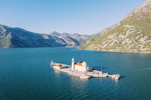 Church of Our Lady of the Rocks on the island of Gospa od Skrpjela. Bay of Kotor, Montenegro. Drone. High quality photo