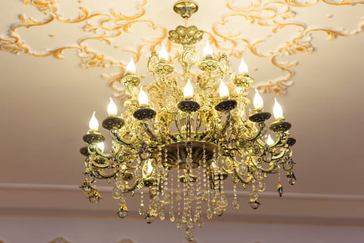 beautiful crystal chandelier in a room. lamp