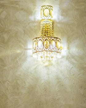 Close-up of a beautiful crystal chandelier. beautiful crystal chandelier in a room