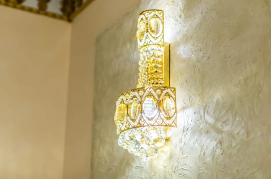 beautiful crystal chandelier in a room. lamp