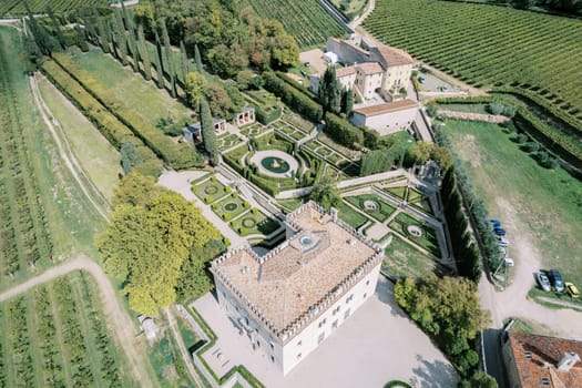 Green garden with artfully trimmed bushes and hedges near Villa Rizzardi. Valpolicella, Italy. Drone. High quality photo