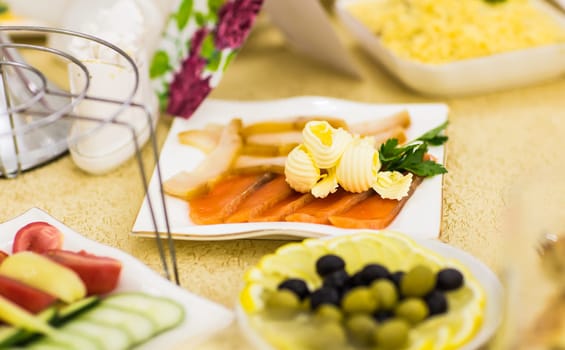 Snack of sliced red fish. Festive table