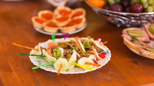 Canapes and appetizers on the festive table