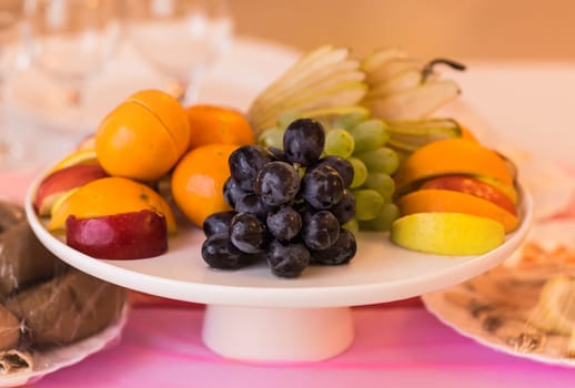 Fresh fruit party plate. dish for the festive table