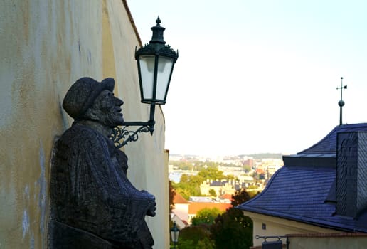 Statue of a man playing guitar at the Prague city